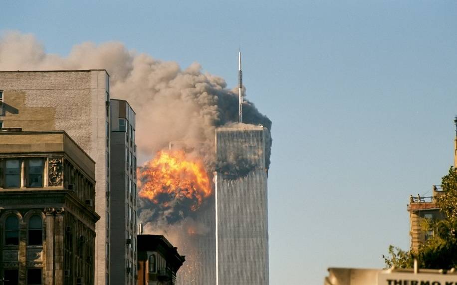 Per Professor Pedia: The South Tower (left) of the World Trade Center shortly after impact from United Airline