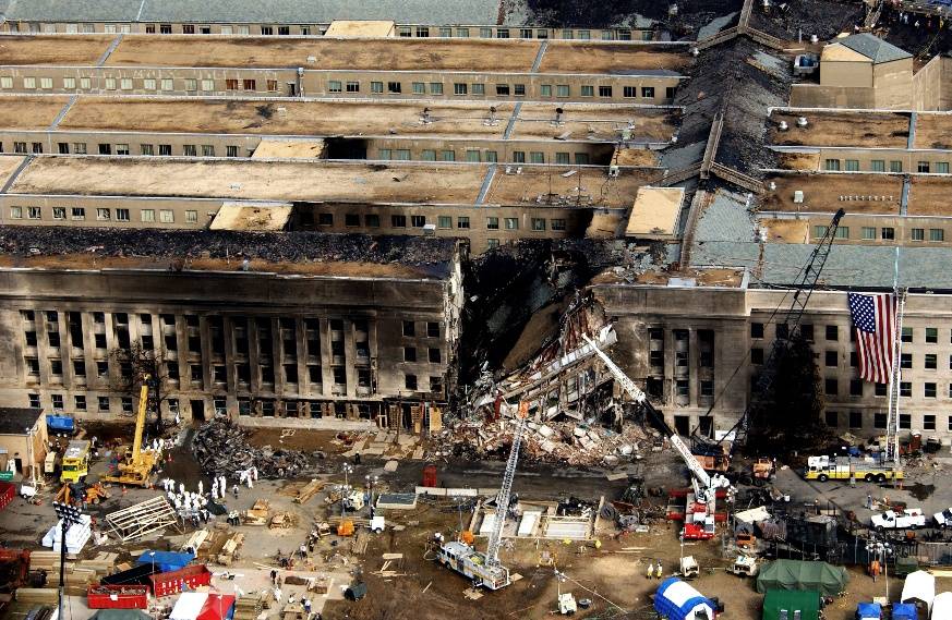 Per Professor Pedia: The South Tower (left) of the World Trade Center shortly after impact from United Airline
