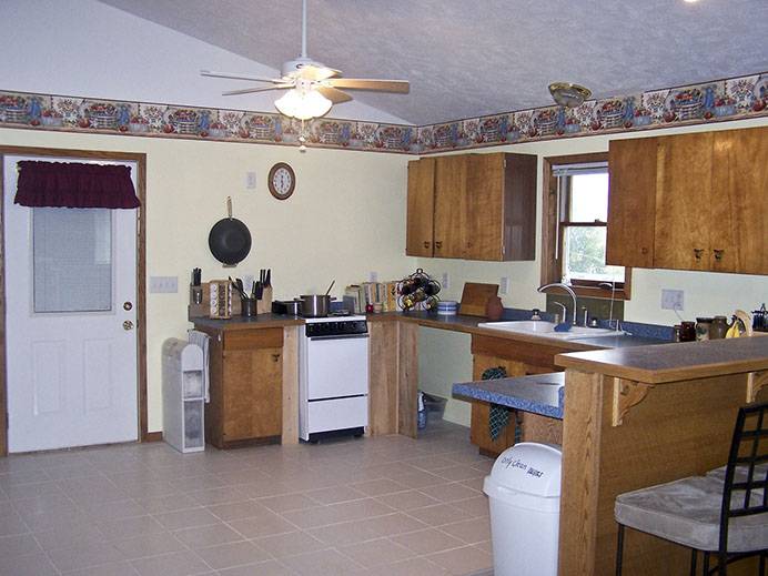 Left, the Burr Oak Center’s large but barren kitchen, which (right) outside began similarly barren: Soon, it b