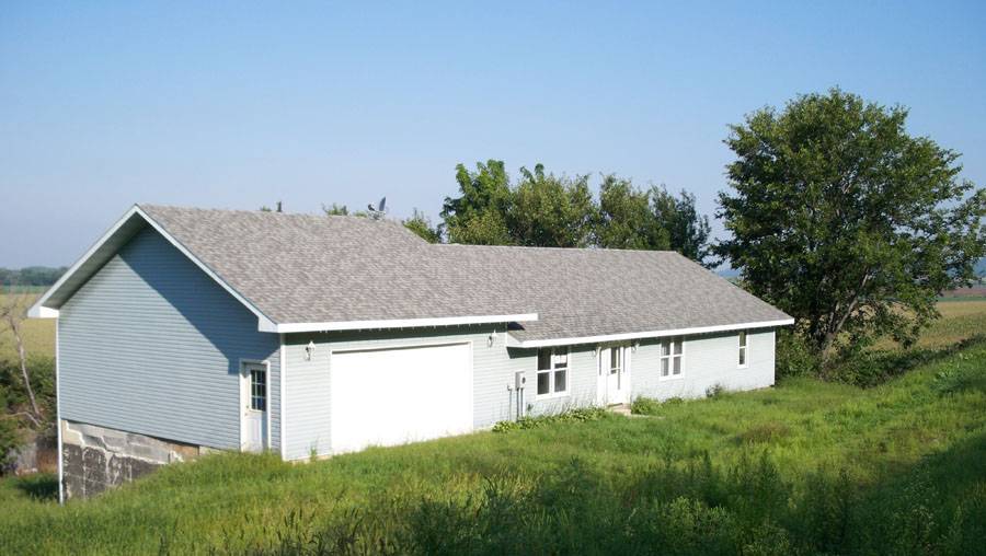 Left, the Burr Oak Center’s large but barren kitchen, which (right) outside began similarly barren: Soon, it b