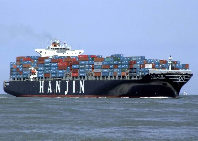 The Hanjin-Palermo seen (left) from the bridge while docked near New York City, and on the High Seas, right.